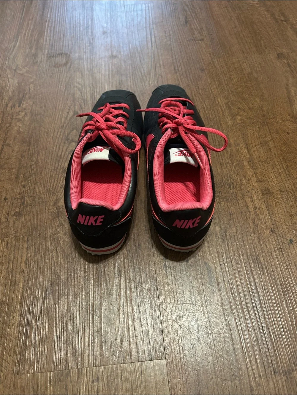 Nike Women’s Black and Hot Pink Low-Top Sneakers